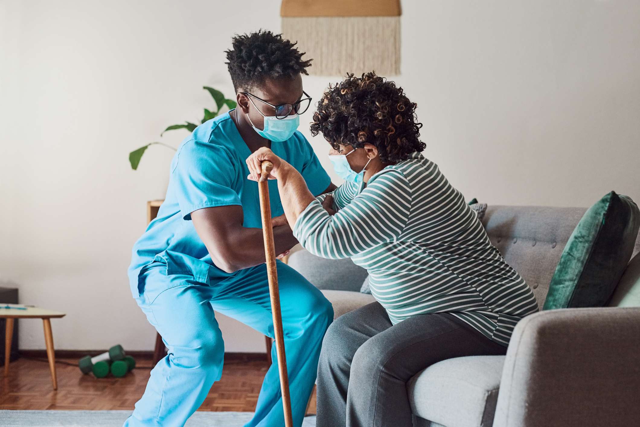 Nurse helping a patient stand image