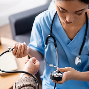 medical professional doing blood pressure test