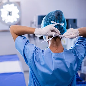 medical professional preparing for a procedure image