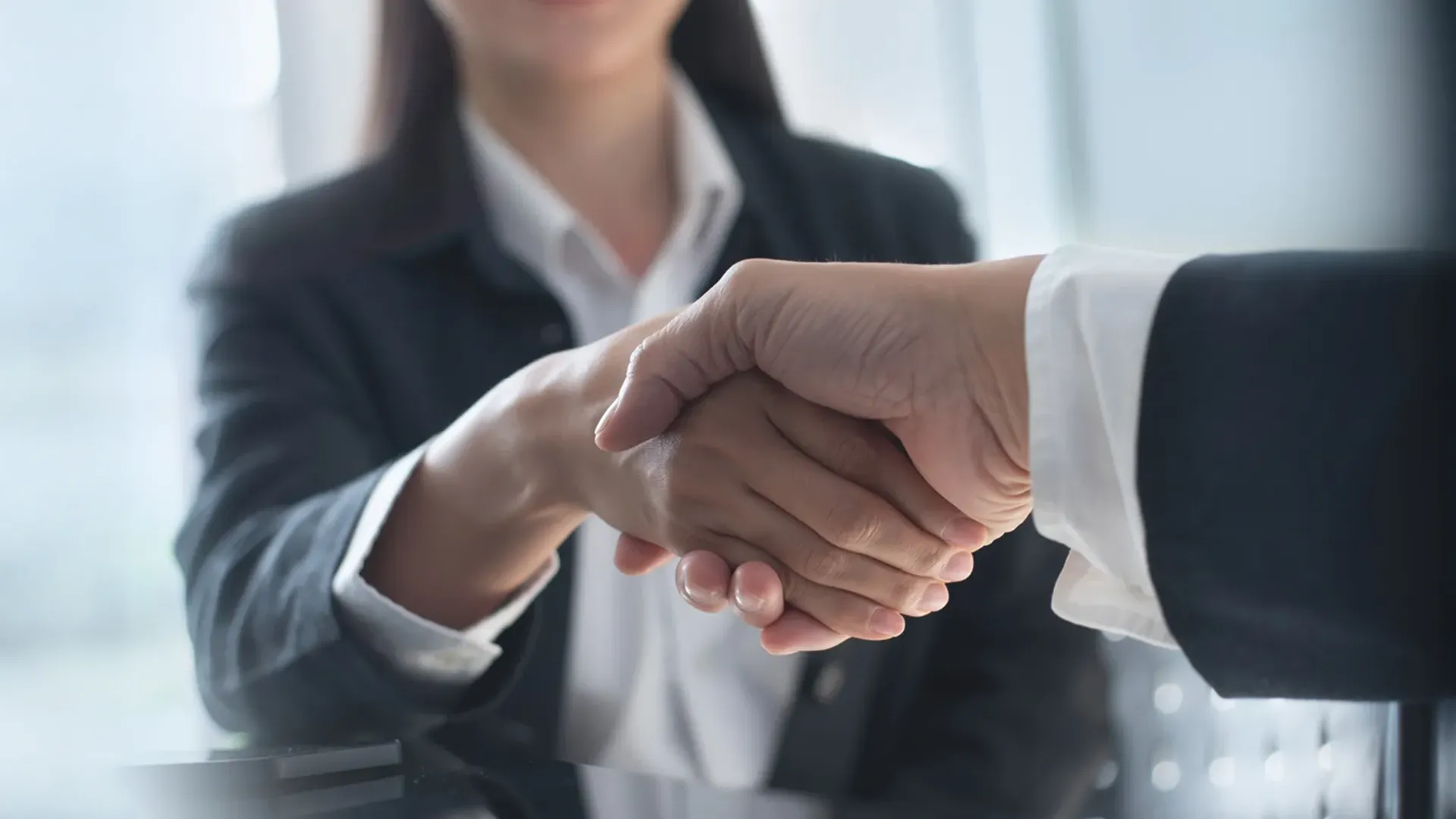 picture of a women shaking hands